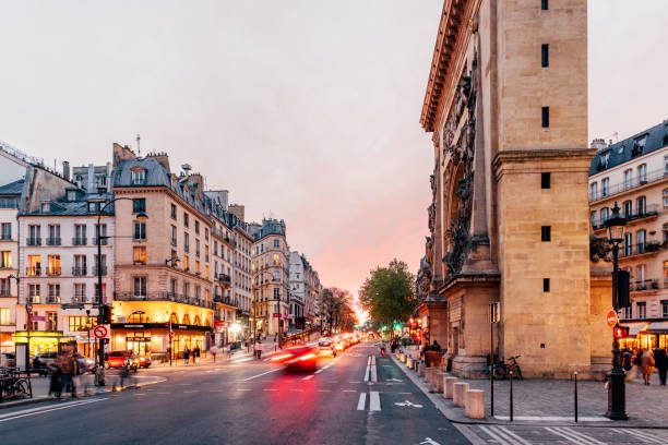 A wide Parisian boulevard at evening